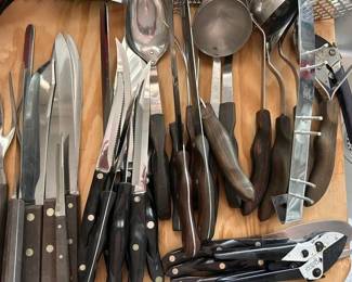 Huge amount of Cutco knives and utensils.