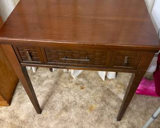 Vintage sewing machine with cabinet