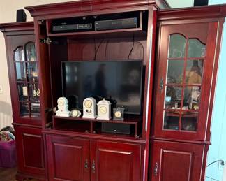 Entertainment center with lots of storage. Tv and dvd player