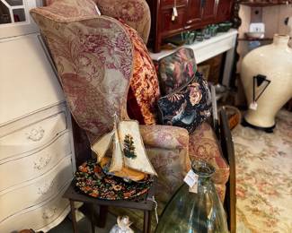 Vintage clawfoot wingback, ceramics, glass sculptures