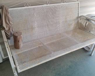 Patio furniture includes two matching chairs 