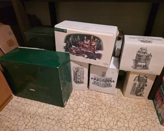 Department 56 Dickins Christmas vintage houses and Figurines. These have been put into the original boxes for purchase. 