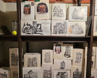Department 56 Dickins Christmas vintage houses and Figurines. These have been put into the original boxes for purchase. 