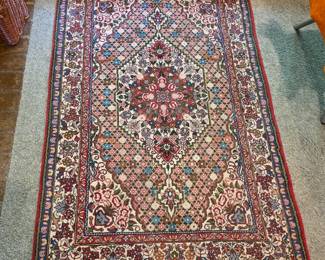75"x41" hand-made Persian wool rug featuring intricate floral design excellent condition, no stains!