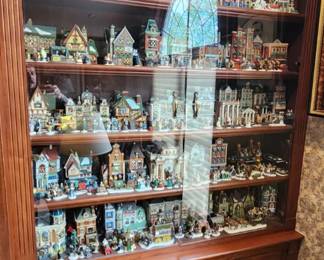 Department 56 Dickins Christmas vintage houses and Figurines. These have been put into the original boxes for purchase. 