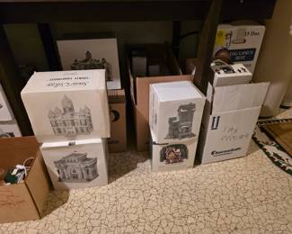 Department 56 Dickins Christmas vintage houses and Figurines. These have been put into the original boxes for purchase. 