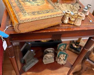 Antique Side Table Ornate Photo Album Brass Candlesticks Blue White Pottery Figurines