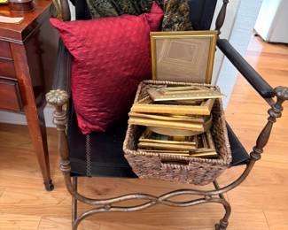 Wrought Iron Bench Decorative Pillows Gilt Picture Frames Oil Paintings Wall Art