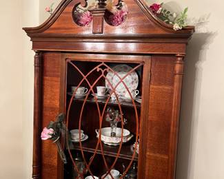 Corner curio cabinet