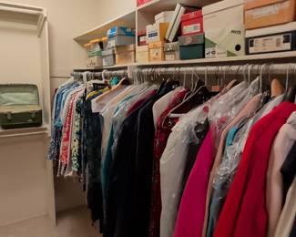 Assorted Women's Clothing and Shoe Boxes