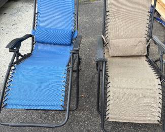 Gravity chairs (tan one has a broken arm)
