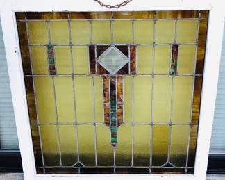 Antique stained glass window (overall 32”W, 35”H)