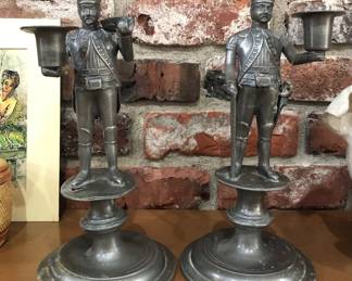 Pair of old pewter soldier candle holders (11" tall) - damaged