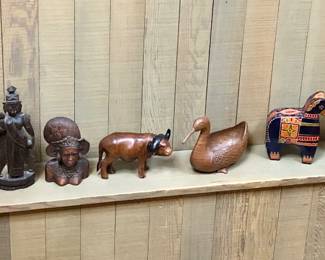 Wood carvings from Bali & beyond, tooled leather animal banks, Indian elephant