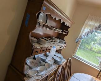 Classic solid oak hutch with lots of storage and display space. Noritake Rosemarie and Sonata Japanese fine china sold separately.