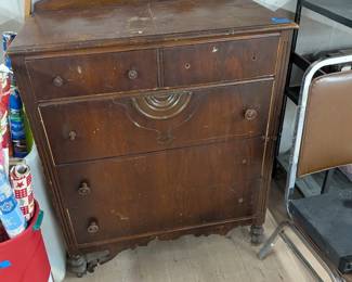 Vintage dark wood chest of drawers.