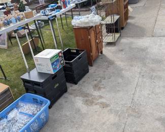 Christmas lights and decor, rolling carts, and a variety of small household storage and furniture