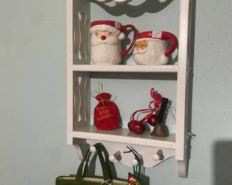 Holiday items on wooden shelf
