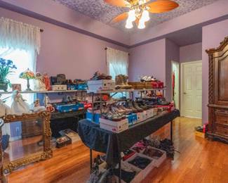 An entire room dedicated to shoes and handbags. More photos below.