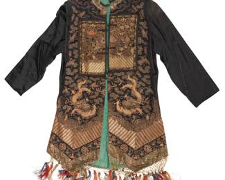 1355 A Chinese embroidered Qing court-style garment Late Qing Dynasty (1644-1912) and later Comprising a black silk lady's long vest or 'xiapei', composed of various applied embroidered textile elements including two silver pheasant civil rank badges, to front and back, and the vest with large dragons to each side, surrounded by bats, medallions, and other auspicious symbols as well as clouds, waves, and flowers, the designs primarily worked in couched metallic threads, and all mounted to later-added Western-style black satin sleeves, with shoulder pads, side gussets, and knotted braid toggle closures, with green silk lining and decorative tasseled fringe 39" H x 27.5" W approximately; sleeves: 23"; fringe: 9" H Estimate: $1,500 - $2,500