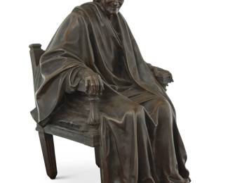 1192 A French patinated bronze model of Voltaire After the model by Jean-Antoine Houdon (1741-1828), 19th century Impressed number verso: 12501 13.5" H x 8" W x 11" D Estimate: $700 - $900