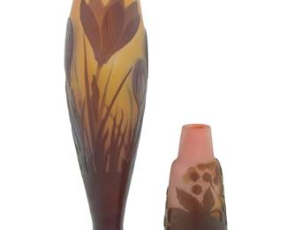 1103 Two Émile Gallé cameo glass vases Early 20th century Each signed in cameo: Gallé The taller decorated with crocus, the bud vase depicting ivy leaves and berries 2 pieces Taller: 8.625" H x 2.625" Dia.; Shorter: 4" H x 1.75" Dia. Estimate: $1,000 - $1,500