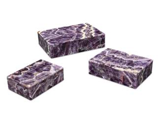 1310 Three amethyst and marble boxes Late 20th century Each with marble interior and brass hinge 3 pieces Largest: 1.625" H x 6.125" W x 4.25" D; Smallest: 1.375" H x 4" W x 2.75" D Estimate: $800 - $1,200
