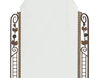1115 An Art Deco style wrought metal mirror 20th century In the manner of Edgar Brandt (1880-1960), with mixed metal frame depicting roses, foliate motifs, scrolls, and opposed ladders 45.75" H x 35" W x 1.5" D Estimate: $500 - $700