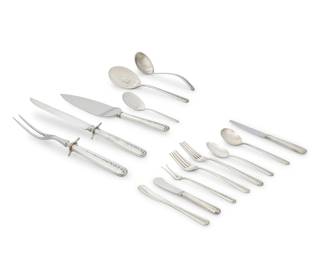 1233 A Towle sterling silver 'Rambler Rose' flatware service Mid/late 20th century Designed 1937 Each marked for maker, pattern, and sterling; each monogrammed Comprising: 16 dinner knives (8.75") 14 butter knives (5.875") 2 master butter spreaders (5.625") 12 dinner forks (7.5") 13 salad forks (6.75") 13 cream soup spoons (6.5") 18 teaspoons (6") 1 pickle fork (6") 1 pie server (9.875") 1 bon bon spoon (5") 1 slotted serving spoon (7.625") 1 ladle (6.875") 2-piece carving set (larger: 9.875") 95 pieces Total weighable sterling: 81.1 oz. troy approximately Estimate: $2,000 - $3,000