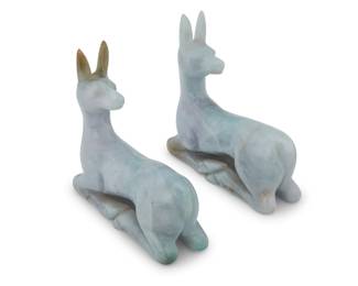 1165 A pair of Chinese carved hardstone recumbent deer 20th century or later 2 pieces Each: 4.5" H x 4.75" W x 1.625" D Estimate: $500 - $700