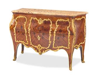 1087 A Louis XV style gilt bronze mounted marquetry commode François Linke (1855-1946), fourth quarter 19th century Signed to one mount: F. Linke The Brech d'alep marble top over two long drawers with floral marquetry veneer and gilt-bronze mounts raised on slightly out swept legs 35.75" H x 46" W x 20" D Estimate: $6,000 - $8,000