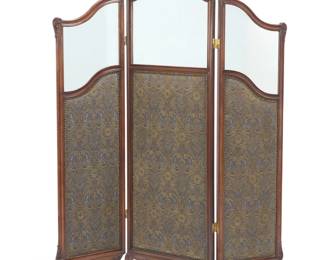1351 A Louis XV style upholstered walnut three panel screen Late 19th/early 20th century With mirrored upper panels above jacquard upholstery with nail head trim Center panel: 72.5" H x 20.5" W x 1.5" D; Each side panel: 64.25" H x 16" W x 1.5" D Estimate: $700 - $900