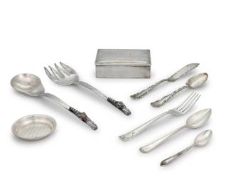 1236 A group of sterling silver flatware and table articles 20th century Each marked for sterling, most marked for maker; most monogrammed Comprising: 12 Wallace dinner/luncheon forks (6.875") 12 Whiting grapefruit spoons (5.875") 12 Alvin demitasse spoons (4.125") 5 nut dishes (2.75") 1 cigarette box with wood liner (1.375" H x 4.5" W x 3.375" D) 2-piece Mexican F. Ramirez blossom salad serving set (larger: 9") 1 Wallace master butter knife (7.5") 1 Whiting sugar spoon (6") 46 pieces Total weighable sterling: 37.8 oz. troy approximately Estimate: $1,200 - $1,800