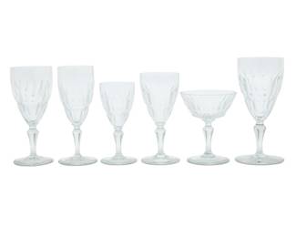 1343 A Baccarat glass 'Auteuil' stemware service Late 20th century Each with etched factory mark Comprising: 16 tall water goblets (7.375") 15 shorter water goblets (6.875") 15 white wine glasses (5.75") 19 claret wine glasses (6.25") 19 champagne coupes/tall sherbets (5") 9 fluted champagne glasses (6.875") 93 pieces Estimate: $800 - $1,200