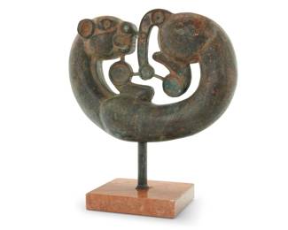 1249 A Scythian style solid bronze coiled panther Possibly circa 2500 BCE Mounted on a marble base Figure: 12.25" H x 16.75" W x 4.375" D; Base: 1.625" H x 8.25" W x 7" D; Overall: 18" H Estimate: $1,000 - $2,000