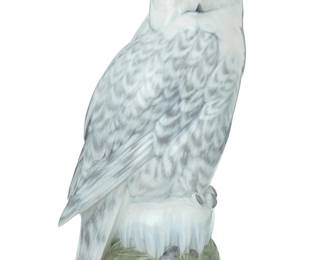 1247 A Royal Copenhagen porcelain owl 1951 Designed by Peter Herold (1879-1920) With green printed factory mark above underglaze blue wave and green painted pattern: 1829 / OH; with indistinct incised signature at base 15.75" H x 8.5" W x 6.75" D Estimate: $600 - $800