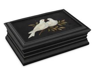 1253 An Italian pietra dura inlaid box Early 20th century Depicting a pair of doves and an olive branch, set into an ebonized wood box with locking hinged lid 2.25" H x 7.625" W x 5.375" D Estimate: $700 - $900