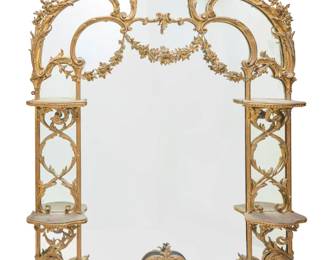 1380 A large George III style giltwood overmantel mirror 19th century Carved with garlands, roses, and foliate motifs, each side with two shelves lined in fabric 69.5" H x 52.5" W x 6.75" D Estimate: $1,000 - $2,000