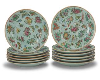 1024 Twelve Chinese polychrome enamel and celadon glazed dishes 18th/19th century or later Each bearing folk kiln/minyao mark Each depicting birds, butterflies, peaches, and floral motifs, with gilt rims 12 pieces Each: 9" Dia. Estimate: $500 - $700