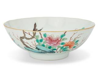 1006 A Chinese enameled porcelain bowl Likely Tongzhi Period (1862-1875) Bearing red painted reign mark The interior and exterior depicting birds and chrysanthemums 2.875" H x 7.5" Dia. Estimate: $1,000 - $1,500