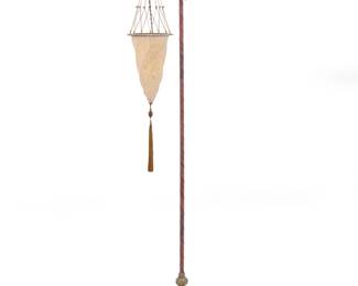 1348 A Fortuny 'Cesendello' floor lamp Late 20th century Originally designed 1904 by Mariano Fortuny (1871-1949) Glass marked: FORTVNY ®; shade metal rim impressed: FORTVNY VENETIA STVDIVM After Byzantine/Roman cesendello lamps, with fabric-clad standard on a velvet-draped base, issuing a single light with spiraling glass shade, adorned with beads and tassels, electrified Overall: 69.75" H x 16" W x11.5" D; Shade: 11.5" H x 7.625" Dia. Estimate: $800 - $1,200
