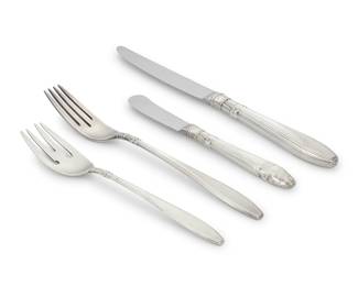  1221 A Gorham sterling silver 'Nocturne' part flatware service Late 20th century Designed 1938 Each marked for Gorham and sterling Comprising: 10 dinner knives (9.5") 11 butter spreaders (6.375") 9 dinner forks (7.875") 3 salad forks (6.75") 33 pieces Total weighable sterling: 21.4 oz. troy approximately Estimate: $1,000 - $1,500