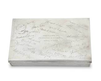 1231 A Tiffany & Co. sterling silver presentation cigar box Mid-20th century With impressed factory marks and: STERLING SILVER / 22358 / L [directorship of William T. Lusk (1956-1965)] The hinged lid opening to reveal a gilt lid underside and a wood-clad three-compartment interior, engraved 'PRESENTED TO FRANCIS J. CURTIS APRIL 13, 1959' and with numerous facsimile signatures 1.75" H x 9.375" W x 6" D 33.6 gross oz. troy approximately Estimate: $600 - $800