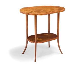 1100 An Émile Gallé marquetry two tiered table Circa 1900 Signed in the marquetry: Gallé The shaped oval top with mixed wood marquetry depicting floral and foliate motifs, raised on flared reeded legs joined by an undertier 28.5" H x 28.5" W x 20.25" D Estimate: $1,200 - $1,800