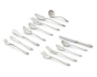 1224 A Reed & Barton sterling silver 'Fragrance' flatware service Mid/late 20th century Designed 1941 Each marked for maker and sterling Comprising: 24 dinner knives (9") 24 luncheon forks (7.125") 24 salad forks (6.125") 8 cocktail/seafood forks (5.5") 23 teaspoons (6") 21 cream soup spoons (6") 20 butter spreaders (6") 4 tablespoons (8.5") 1 gravy ladle (5.75") 2 shell sugar spoons (6.25") 2 master butter knives (7.25") 2 pierced serving forks (7.5") 2 jelly spoons (6") 157 pieces Total weighable sterling: 153.6 oz. troy approximately Estimate: $2,000 - $3,000