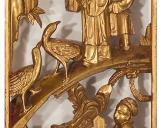 1044 Three Chinese carved giltwood panels 20th century Each openwork panel depicting a figural scene, mounted to an acrylic backing 3 pieces Each wood: 18.25" H x 7.125" W x 1.375" D Estimate: $500 - $800