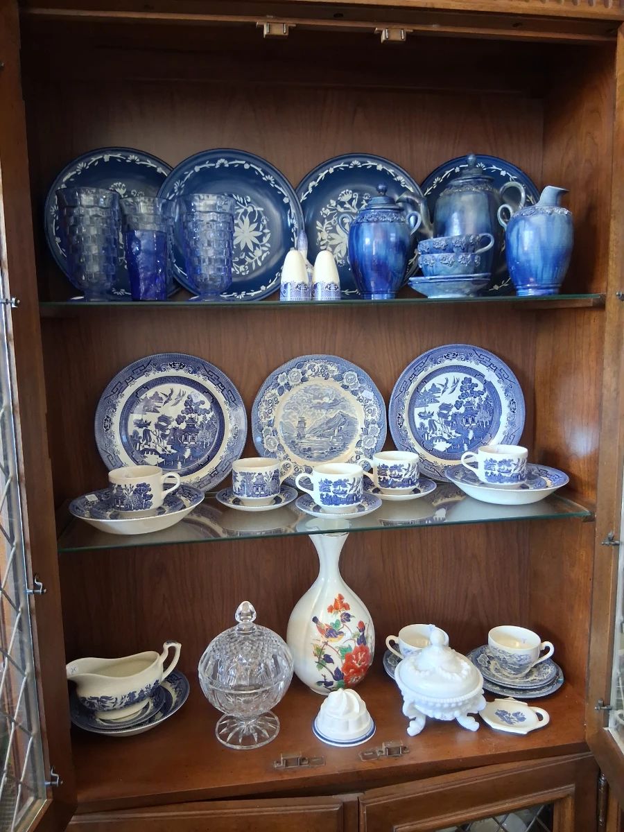 Mexican drip glaze, blue enamelware, blue willow, lighted china cabinet