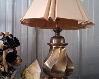 Heavy vintage brass lamp and a jaunty little strawberry fella