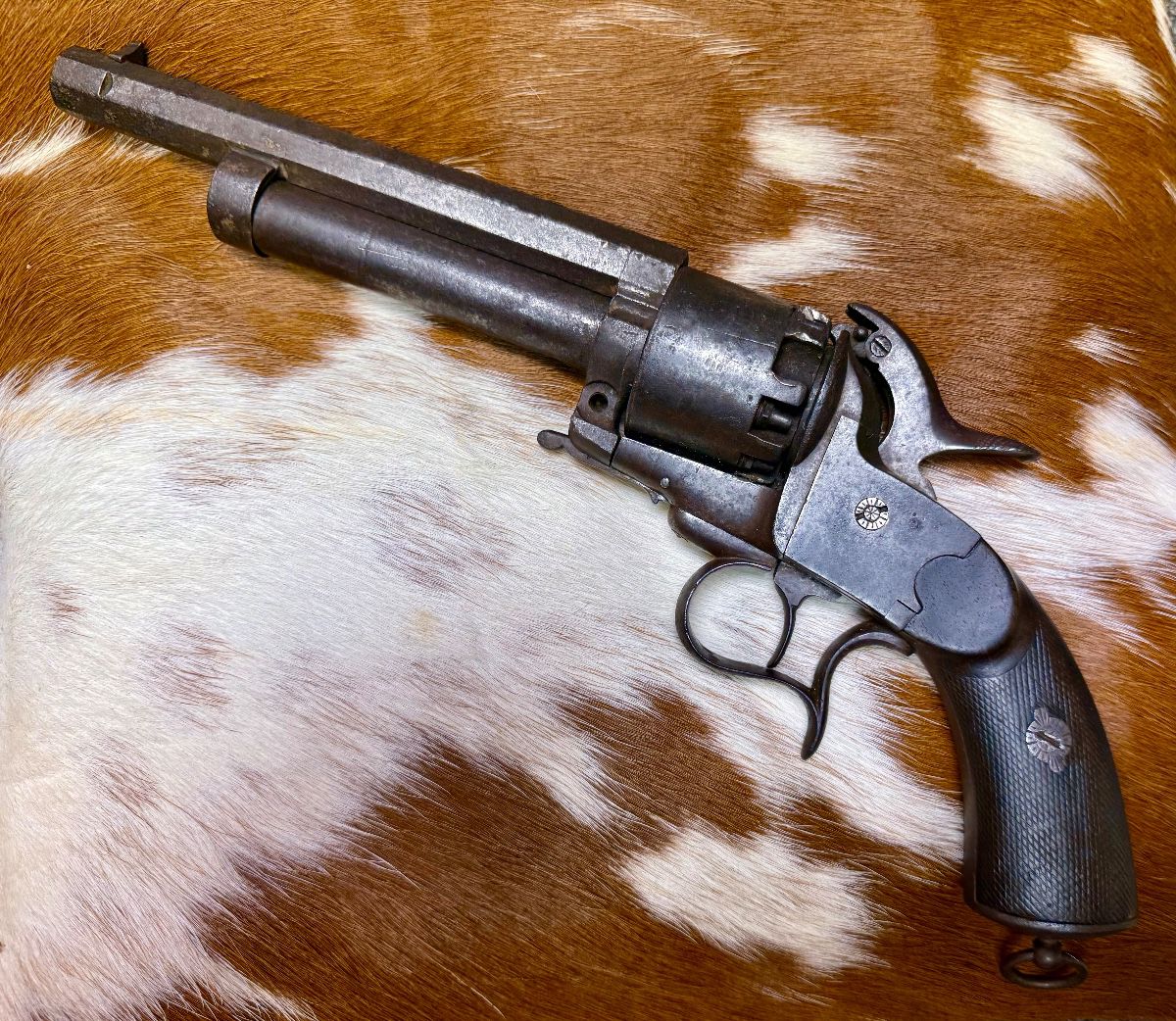 Rare Civil War era Confederate LeMat Grapeshot Percussion Revolver, serial no. 601, featuring the iconic 9-shot cylinder with center grapeshot barrel configuration. A highly sought-after collector firearm with strong Confederate and Civil War historical appeal. An exceptional opportunity for advanced arms collectors and military history enthusiasts.