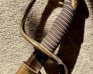 Civil War Era US Model 1850 Foot Officer’s Sword by W.H. Horstmann & Sons, Philadelphia. Features engraved straight blade with military trophies, original leather and wire grip, and metal scabbard. Ricasso marked “W.H. Horstmann & Sons / Philadelphia”.